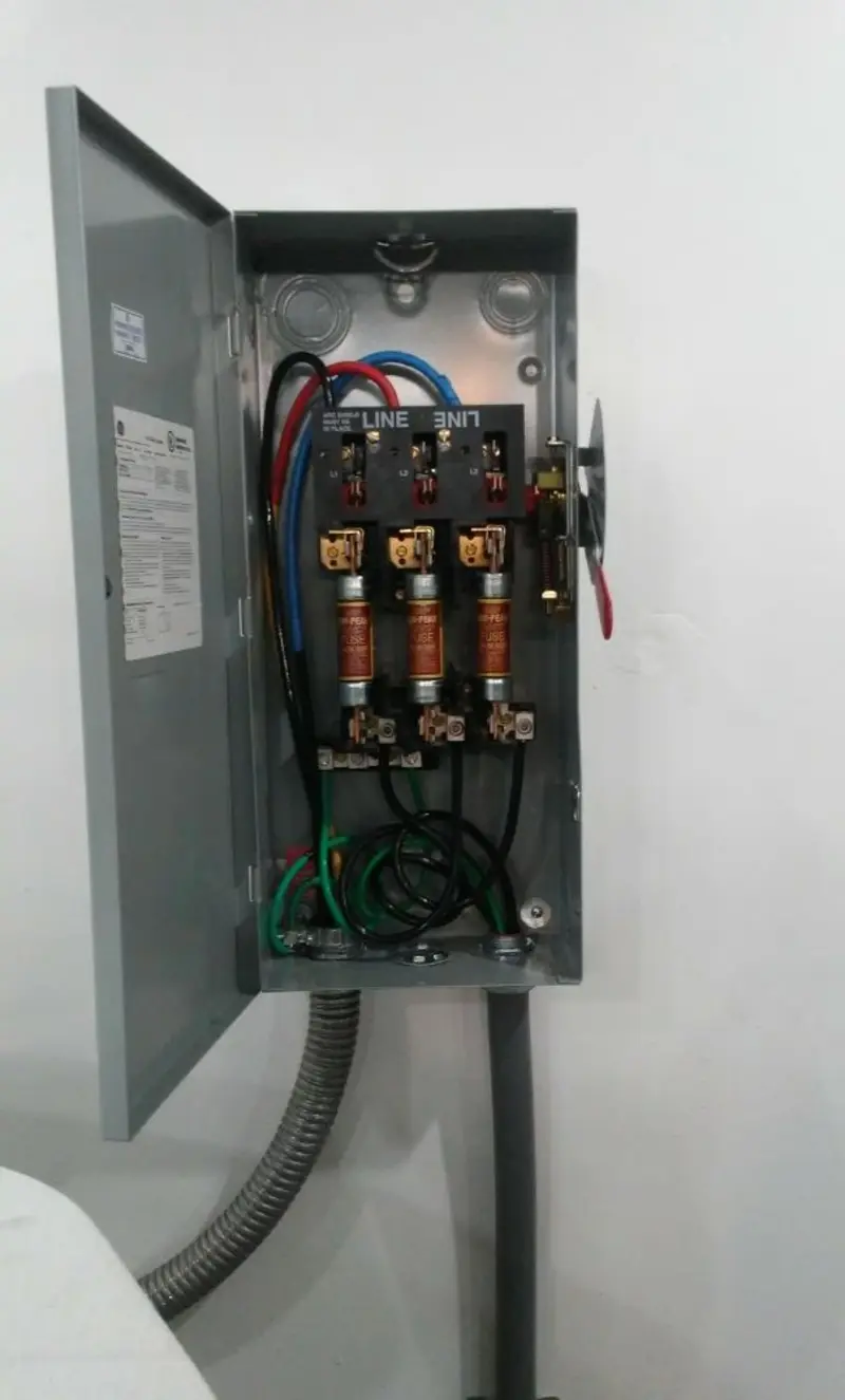 Three-phase disconnect switch installed for Smoke Detector Installation in Newberry