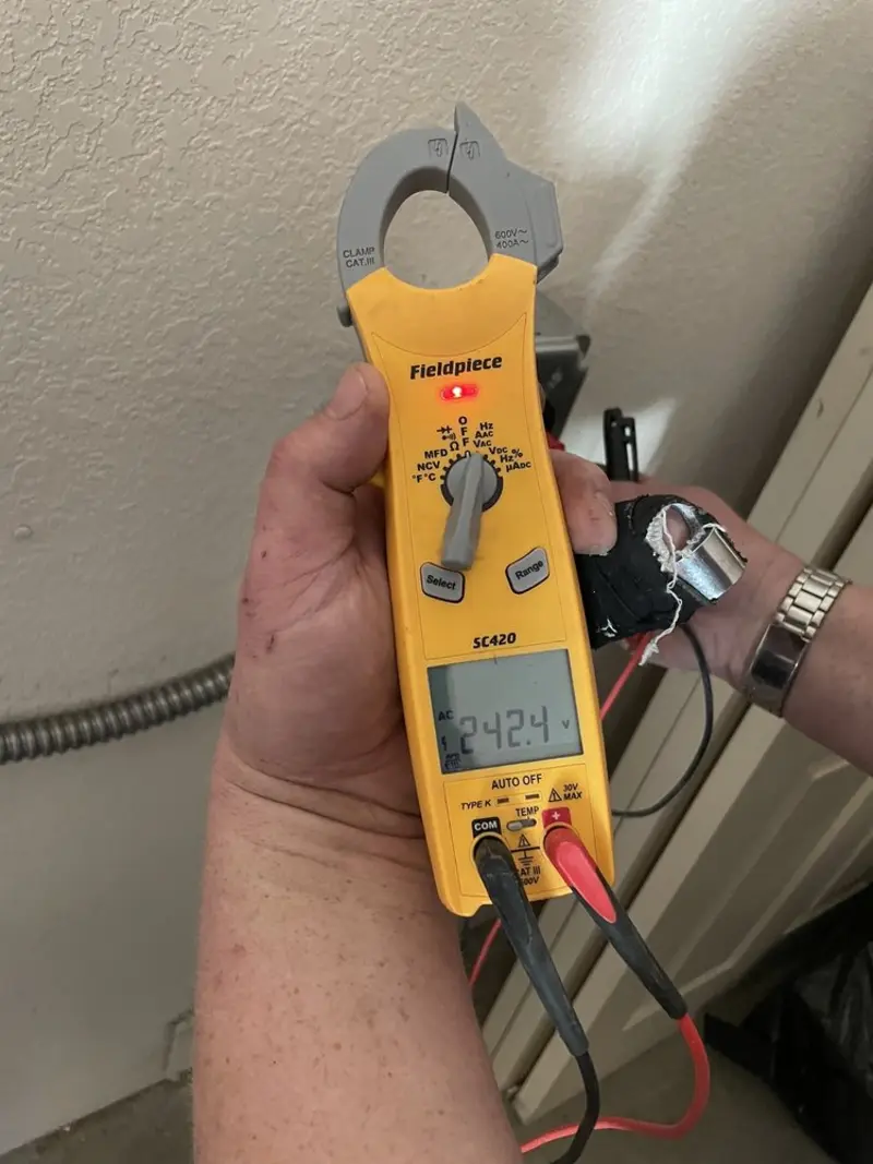Voltage testing with clamp meter during Circuit Breaker Repair in Newberry